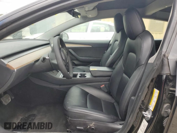 2022 Tesla Model 3 with VIN 5YJ3E1EA0NF372095, listed as a Copart auction lot 54958215 with 148,441 mi miles and Clean Title. Bid and sale history available at DreamBid. Image 7.