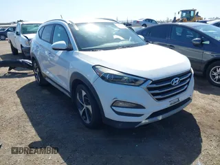 2017 Hyundai Tucson Value z VIN KM8J33A27HU438902, wystawiony jako IAAI lot #41835502 z przebiegiem 84 885 mil mil oraz . Historia ofert i sprzedaży dostępna na DreamBid. Obrazek 1.
