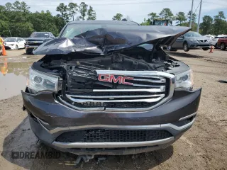 2017 GMC Acadia SLE z VIN 1GKKNLLA9HZ167808, wystawiony jako Copart lot #58584555 z przebiegiem 179 948 mil mil oraz Szkoda całkowita • Salvage title. Historia ofert i sprzedaży dostępna na DreamBid. Obrazek 5.