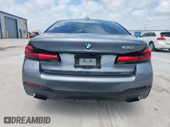 2022 BMW 5 Series 530i with VIN WBA53BH00NWX59634, listed as a Copart auction lot 61598505 with 69,130 mi miles and Salvage title. Bid and sale history available at DreamBid. Image 6.