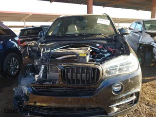 2017 BMW X5 xDrive40e iPerformance with VIN 5UXKT0C35H0V97078, listed as a IAAI auction lot 41601844 with 85,597 mi miles. Bid and sale history available at carsss.com. Image 12.