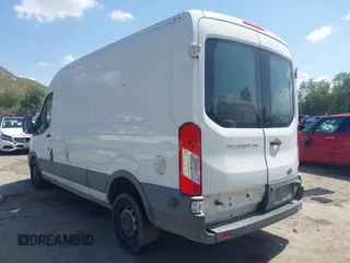 2016 Ford Transit Cargo z VIN 1FTBW2CM4GKA02611, wystawiony jako IAAI lot #41845080 z przebiegiem 175 109 mil mil oraz . Historia ofert i sprzedaży dostępna na DreamBid. Obrazek 3.