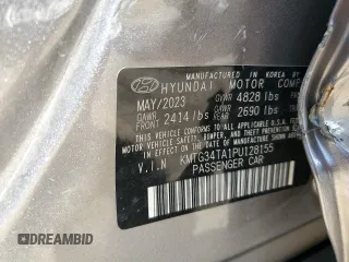 2023 Genesis G70 2.0T with VIN KMTG34TA1PU128155, listed as a Copart auction lot 50875574 with 16,092 mi miles and Non Repairable. Bid and sale history available at DreamBid. Image 12.