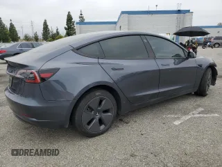 2023 Tesla Model 3 with VIN 5YJ3E1EA4PF642769, listed as a Copart auction lot 50648825 with 25,310 mi miles and Salvage title. Bid and sale history available at DreamBid. Image 3.