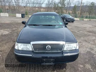 2005 Mercury Grand Marquis LS Premium z VIN 2MEFM75W65X671622, wystawiony jako IAAI lot #41958287 z przebiegiem 154 662 mil mil oraz . Historia ofert i sprzedaży dostępna na DreamBid. Obrazek 12.