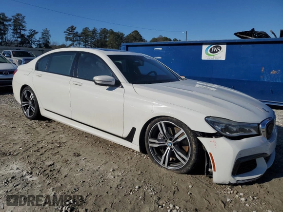 2016 BMW 7 Series 750i with VIN WBA7F0C56GGL99161, listed as a Copart auction lot 87652655 with 97,805 mi miles and Salvage Title. Bid and sale history available at carsss.com. Image 4.