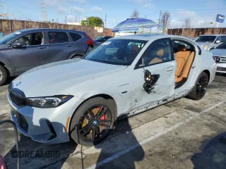 2023 BMW 3 Series 330e with VIN 3MW39FF07P8D26890, listed as a Copart auction lot 45203065 with 21,679 mi miles and Salvage Title. Bid and sale history available at carsss.com. Image 1.