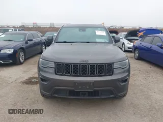 2021 Jeep Grand Cherokee 80th Anniversary z VIN 1C4RJFBGXMC621817, wystawiony jako IAAI lot #41519733 z przebiegiem 60 552 mil mil oraz . Historia ofert i sprzedaży dostępna na DreamBid. Obrazek 12.