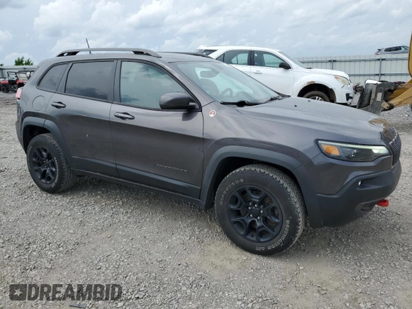 2020 Jeep Cherokee Trailhawk Elite with VIN 1C4PJMBNXLD549505, listed as a Copart auction lot 53468925 with 88,991 mi miles and Salvage title. Bid and sale history available at DreamBid. Image 4.