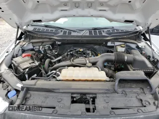 2021 Ford F-150 XL with VIN 1FTMF1EP7MKE72931, listed as a Copart auction lot 60650605 with 23,825 mi miles and Salvage title. Bid and sale history available at DreamBid. Image 11.
