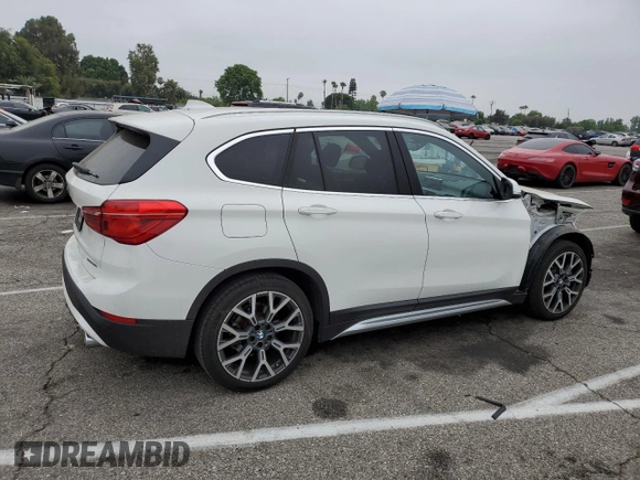 2021 BMW X1 xDrive28i with VIN WBXJG9C09M5U35093, listed as a Copart auction lot 65509155 with 46,875 mi miles and Salvage title. Bid and sale history available at DreamBid. Image 3.