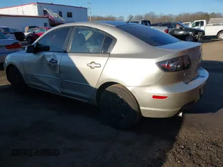 2007 Mazda 3 i Sport with VIN JM1BK32F271735119, listed as a IAAI auction lot 41446801 with 116,879 mi miles. Bid and sale history available at carsss.com. Image 3.