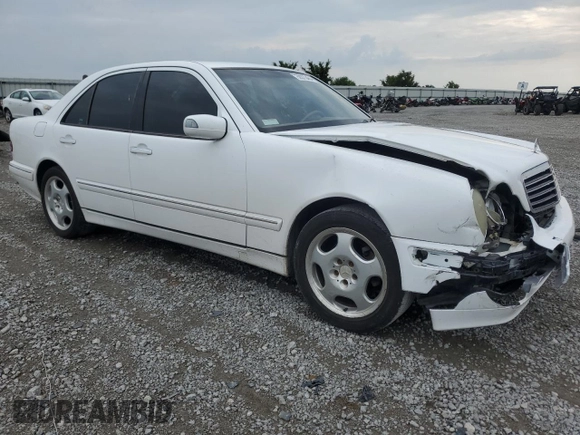 2001 Mercedes-Benz E-Class with VIN WDBJF70J51B332881, listed as a Copart auction lot 63487844 with 216,080 mi miles and Salvage Title. Bid and sale history available at carsss.com. Image 4.