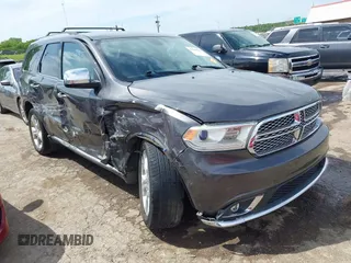 2015 Dodge Durango SXT with VIN 1C4RDHAG8FC127866, listed as a IAAI auction lot 42188826 with 127,689 mi miles and . Bid and sale history available at DreamBid. Image 1.