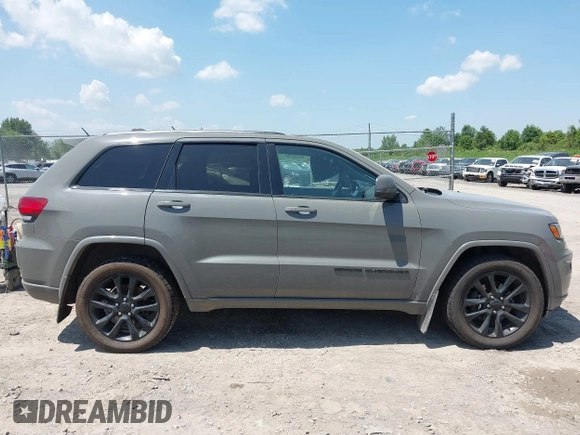 2020 Jeep Grand Cherokee Laredo E with VIN 1C4RJFAG0LC293050, listed as a IAAI auction lot 42566345 with 64,960 mi miles and . Bid and sale history available at DreamBid. Image 13.