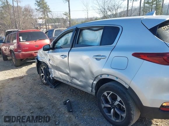 2020 Kia Sportage LX with VIN KNDPM3AC1L7745199, listed as a IAAI auction lot 41650124 with 60,441 mi miles. Bid and sale history available at carsss.com. Image 6.
