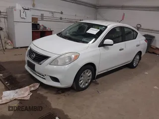 2012 Nissan Versa S with VIN 3N1CN7AP0CL885524, listed as a IAAI auction lot 41961850 with 167,906 mi miles. Bid and sale history available at carsss.com. Image 2.