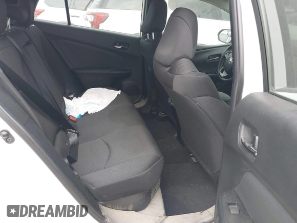 2021 Toyota Prius L Eco with VIN JTDKAMFU5M3132103, listed as a IAAI auction lot 42061511 with 42,116 mi miles and . Bid and sale history available at DreamBid. Image 8.