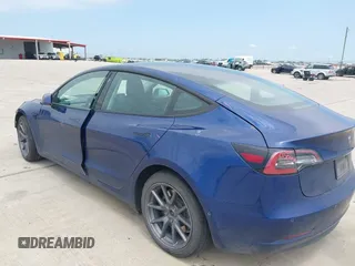 2022 Tesla Model 3 Long Range z VIN 5YJ3E1EB2NF246443, wystawiony jako IAAI lot #42179219 z przebiegiem Nie podano mil oraz . Historia ofert i sprzedaży dostępna na DreamBid. Obrazek 3.