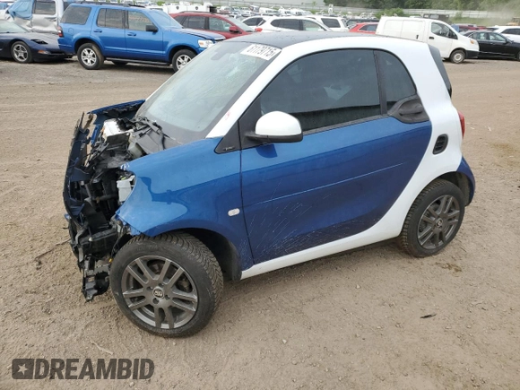 2016 Smart fortwo Passion z VIN WMEFJ5DA9GK062214, wystawiony jako Copart lot #61179715 z przebiegiem 58 152 mil mil oraz Czysty tytuł • Clean title. Historia ofert i sprzedaży dostępna na DreamBid. Obrazek 1.