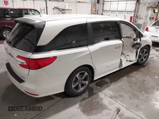 2019 Honda Odyssey Touring with VIN 5FNRL6H83KB051363, listed as a IAAI auction lot 41173587 with 88,512 mi miles. Bid and sale history available at carsss.com. Image 4.