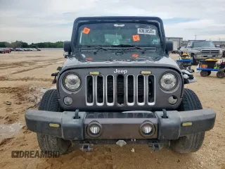 2017 Jeep Wrangler Sahara with VIN 1C4AJWBG4HL670837, listed as a Copart auction lot 60639525 with 153,049 mi miles and Salvage title. Bid and sale history available at DreamBid. Image 5.