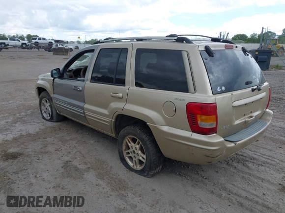 1999 Jeep Grand Cherokee Limited with VIN 1J4GW68SXXC664055, listed as a IAAI auction lot 42339125 with 219,792 mi miles and . Bid and sale history available at DreamBid. Image 3.
