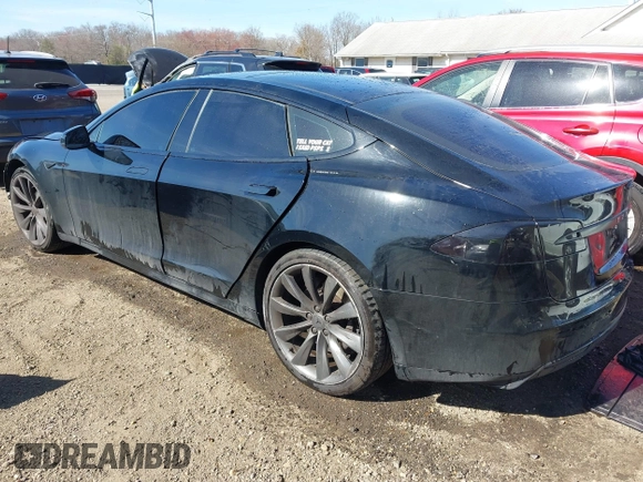 2014 Tesla Model S 60 with VIN 5YJSA1H1XEFP34226, listed as a IAAI auction lot 41806604 with 216,021 mi miles and . Bid and sale history available at DreamBid. Image 3.