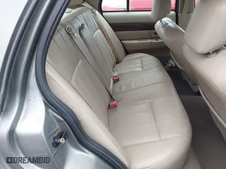 2003 Mercury Grand Marquis LS Premium with VIN 2MEFM75W33X655360, listed as a IAAI auction lot 41922734 with 86,059 mi miles. Bid and sale history available at carsss.com. Image 8.