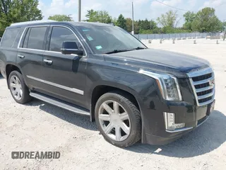 2019 Cadillac Escalade Premium Luxury z VIN 1GYS4CKJ3KR234145, wystawiony jako IAAI lot #42255844 z przebiegiem 134 647 mil mil oraz . Historia ofert i sprzedaży dostępna na DreamBid. Obrazek 1.