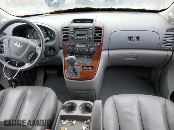 2006 Kia Sedona LX with VIN KNDMB233566097439, listed as a Copart auction lot 77644254 with 124,158 mi miles and Clean Title. Bid and sale history available at carsss.com. Image 8.
