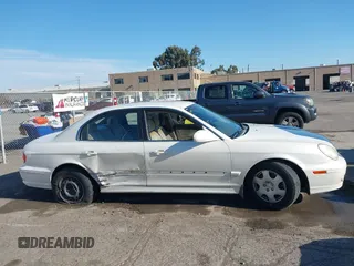 2002 Hyundai Sonata with VIN KMHWF25S92A571901, listed as a IAAI auction lot 41404038 with 133,316 mi miles. Bid and sale history available at carsss.com. Image 13.