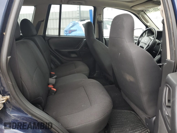 2004 Jeep Grand Cherokee Laredo with VIN 1J4GW48S04C125931, listed as a Copart auction lot 59972695 with 198,403 mi miles and Salvage title. Bid and sale history available at DreamBid. Image 11.
