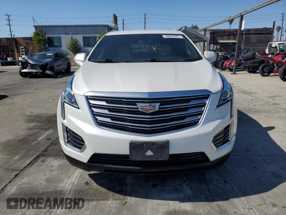 2019 Cadillac XT5 FWD with VIN 1GYKNARS1KZ121732, listed as a Copart auction lot 54882885 with 72,142 mi miles and Salvage title. Bid and sale history available at DreamBid. Image 5.