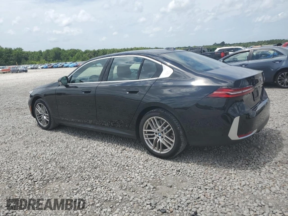 2024 BMW 5 Series 530i with VIN WBA43FJ09RCR05243, listed as a Copart auction lot 61690705 with 34,450 mi miles and Salvage title. Bid and sale history available at DreamBid. Image 2.
