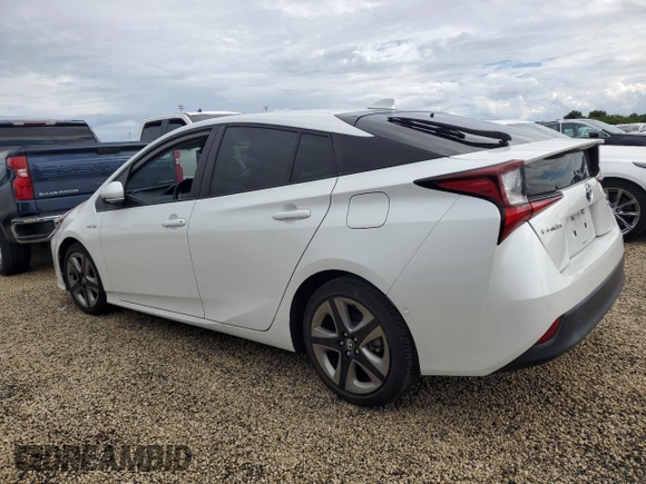 2021 Toyota Prius L Eco с VIN JTDKAMFU5M3142128, выставлен на аукционе Copart как лот 73832324 с пробегом 21 460 миль миль и Списание • Salvage title. История ставок и продаж доступна на DreamBid. Изображение 2.