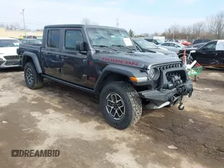2024 Jeep Gladiator Rubicon z VIN 1C6JJTBG5RL110669, wystawiony jako IAAI lot #41694630 z przebiegiem 1 189 mil mil oraz . Historia ofert i sprzedaży dostępna na DreamBid. Obrazek 1.