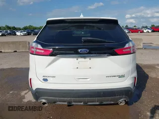 2020 Ford Edge Titanium z VIN 2FMPK3K98LBA42159, wystawiony jako IAAI lot #42358229 z przebiegiem 88 512 mil mil oraz . Historia ofert i sprzedaży dostępna na DreamBid. Obrazek 16.