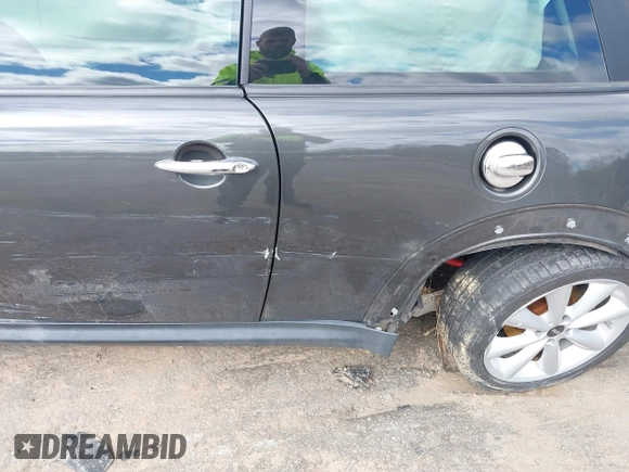 2013 MINI Hardtop S with VIN WMWSV3C50DT394345, listed as a IAAI auction lot 41738216 with 58,241 mi miles and . Bid and sale history available at DreamBid. Image 13.