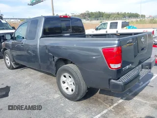 2004 Nissan Titan SE with VIN 1N6AA06A04N567056, listed as a IAAI auction lot 42044609 with 122,174 mi miles. Bid and sale history available at carsss.com. Image 3.