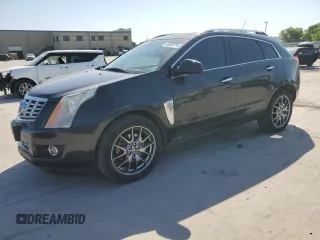 2015 Cadillac SRX Performance Collection z VIN 3GYFNCE36FS555028, wystawiony jako Copart lot #53088195 z przebiegiem 163 457 mil mil oraz Szkody całkowita. Historia ofert i sprzedaży dostępna na DreamBid. Obrazek 1.