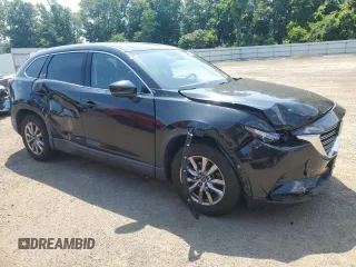 2019 Mazda CX-9 Touring with VIN JM3TCACY8K0301086, listed as a Copart auction lot 62193975 with 54,149 mi miles and Salvage title. Bid and sale history available at DreamBid. Image 4.