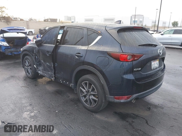 2018 Mazda CX-5 Touring with VIN JM3KFACM9J0464621, listed as a IAAI auction lot 41723627 with 45,916 mi miles. Bid and sale history available at carsss.com. Image 3.