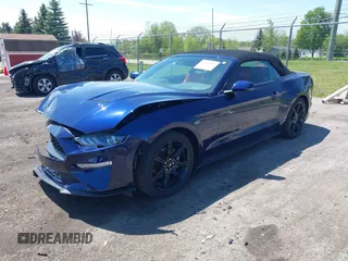 2020 Ford Mustang EcoBoost with VIN 1FATP8UH2L5127689, listed as a IAAI auction lot 42219307 with 21,399 mi miles and . Bid and sale history available at DreamBid. Image 2.