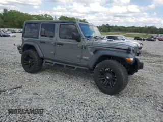 2020 Jeep Wrangler Unlimited Sport with VIN 1C4HJXDG6LW311546, listed as a Copart auction lot 51675395 with 27,679 mi miles and Salvage title. Bid and sale history available at DreamBid. Image 4.