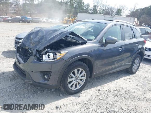 2015 Mazda CX-5 Touring with VIN JM3KE2CY2F0530204, listed as a IAAI auction lot 41788921 with 50,827 mi miles. Bid and sale history available at carsss.com. Image 2.