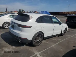 2021 Porsche Cayenne with VIN WP1AA2AYXMDA00148, listed as a Copart auction lot 52647565 with 27,977 mi miles and Salvage title. Bid and sale history available at DreamBid. Image 3.