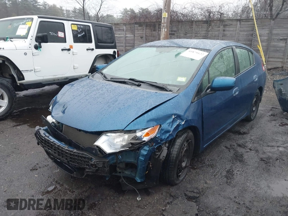 2012 Honda Insight with VIN JHMZE2H31CS005377, listed as a IAAI auction lot 41879122 with 136,646 mi miles and . Bid and sale history available at DreamBid. Image 2.