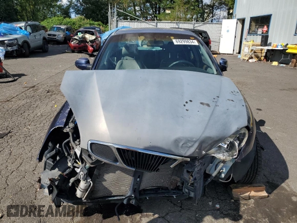 2001 Daewoo Nubira CDX z VIN KLAJB52Z31K647237, wystawiony jako Copart lot #69299834 z przebiegiem 51 513 mil mil oraz Szkody całkowita. Historia ofert i sprzedaży dostępna na DreamBid. Obrazek 5.
