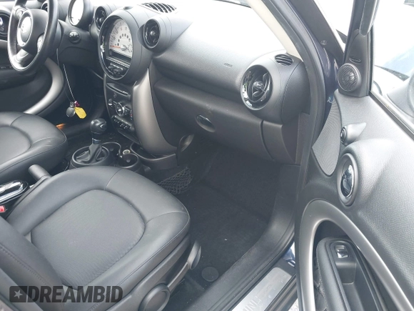 2013 MINI Countryman with VIN WMWZB3C58DWM07817, listed as a IAAI auction lot 41962291 with 60,763 mi miles and . Bid and sale history available at DreamBid. Image 5.